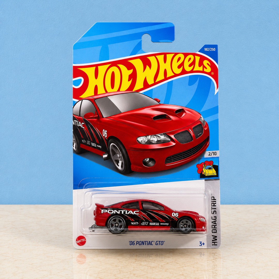 Hot Wheels 2006 Pontiac GTO red 1:64 scale die-cast car on original card made in Malaysia